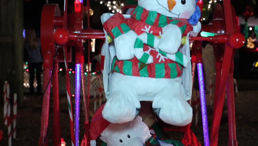 Red Neon Christmas Ferris Wheel Rotating Featuring snowman, santa claus, penguin, and reindeer toys 