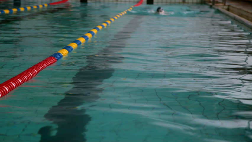 Swimmer performing the butterfly stroke