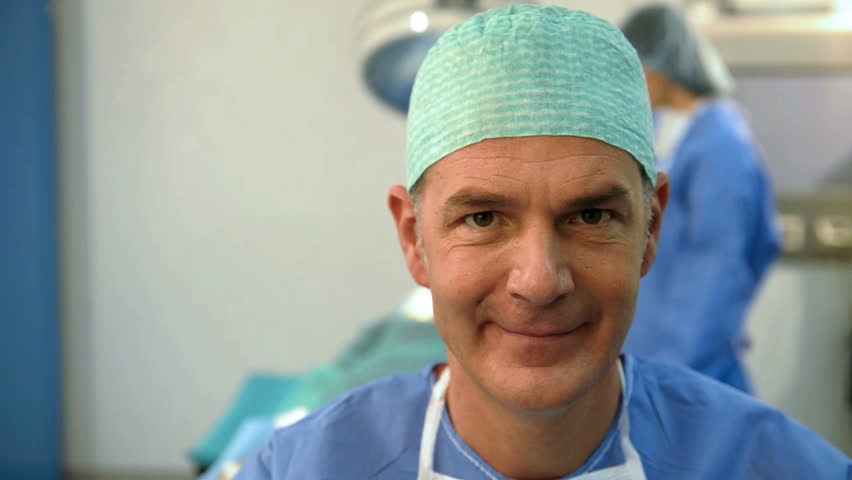 Portrait of A Smiling    Male Surgeon; HD Photo JPEG, dolly.