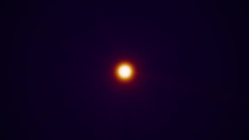 Glowing nebular slowly evolves as stars fly towards the camera.