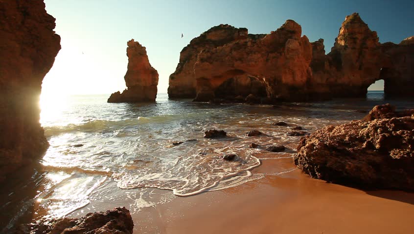 Beautiful sunrise on the rocky atlantic ocean coast in Lagos, Portugal