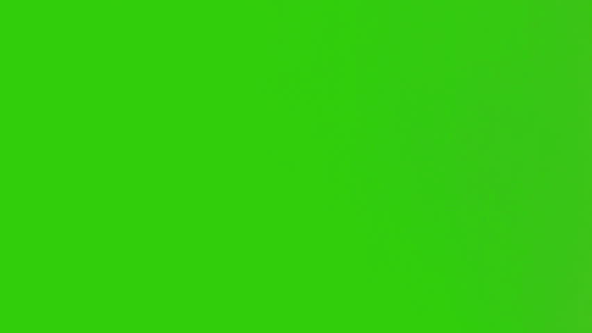 Chromakey footage of an african woman writing something on a book