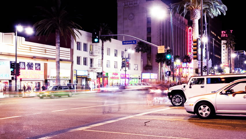 LOS ANGELES - AUGUST 27: Timelapse of traffic and people on Hollywood Boulevard and Highland Avenue on August 27, 2010 in Los Angeles, CA. 