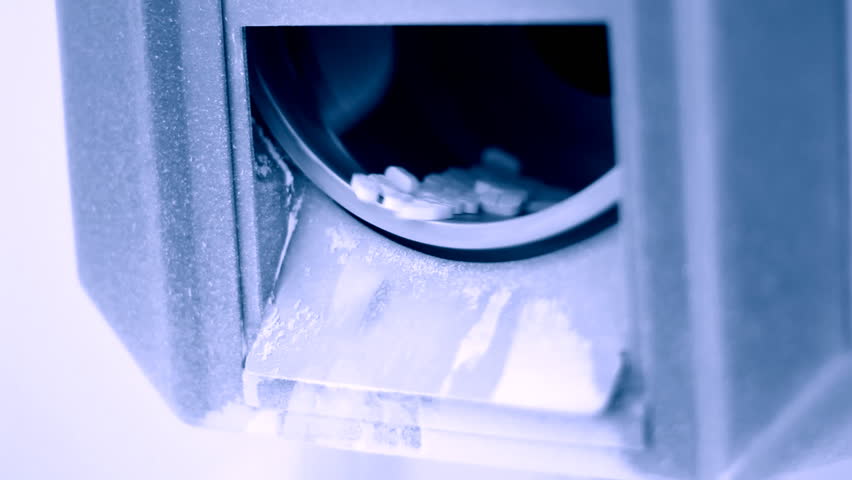 Pills falling out of pill manufacturing machine. Special Light and air conditions in the room.  HD 1080i. 