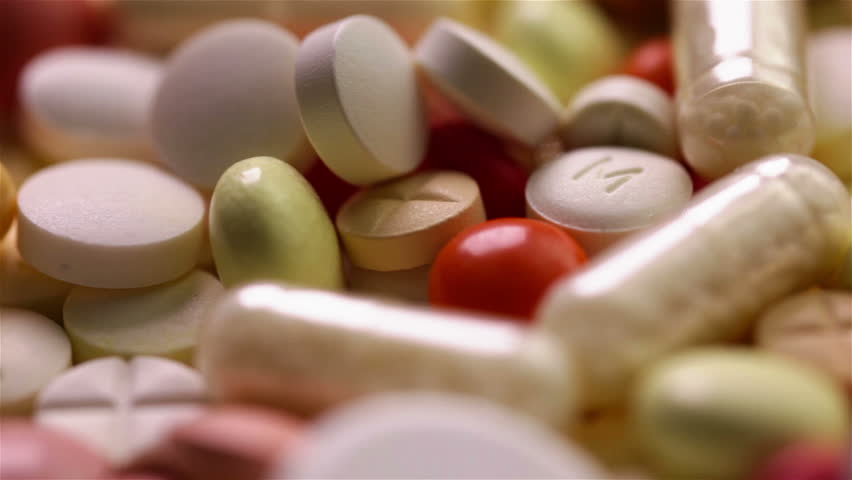 Close up of many different spinning drugs (Full HD)