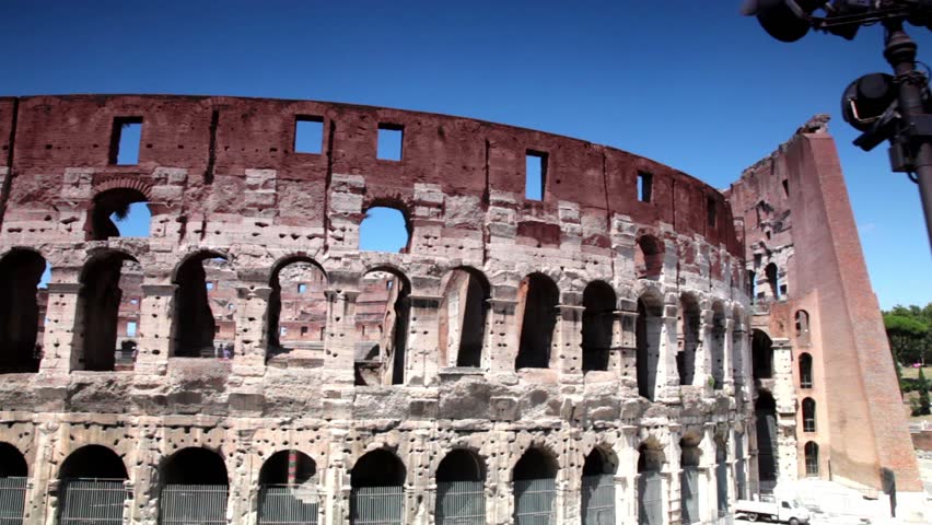 The Coliseum facade shown in motion, then shows some area near