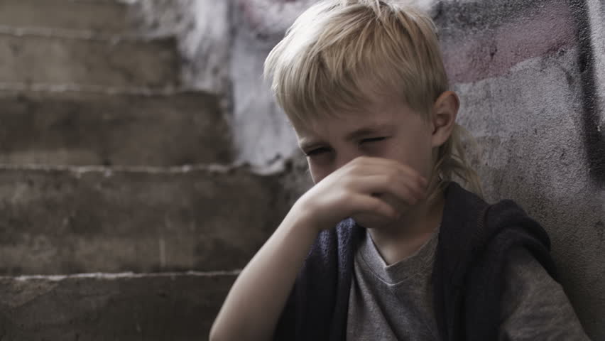 Close-up portrait from series of unhappy boy. Look in portfolio.