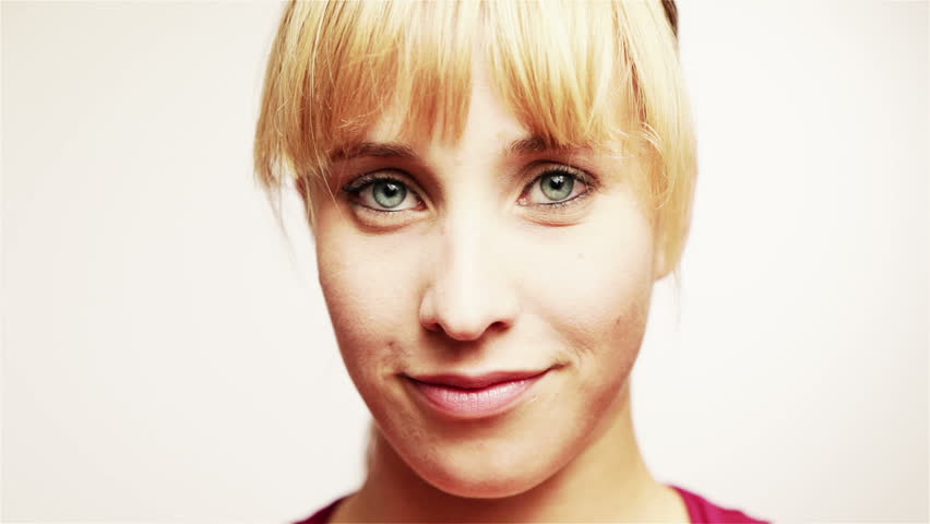 Close-up of a young attractive pensive woman