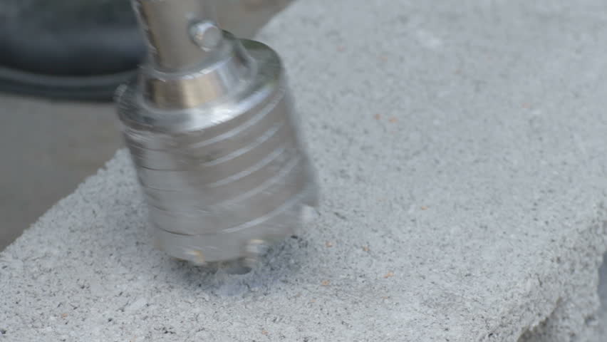 Drilling hole in concrete plank  