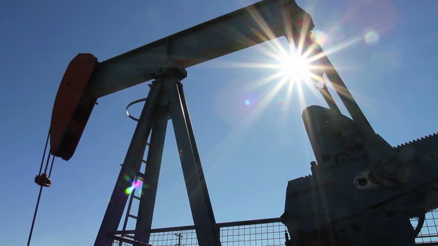 Crude oil pump jack with sunburst
