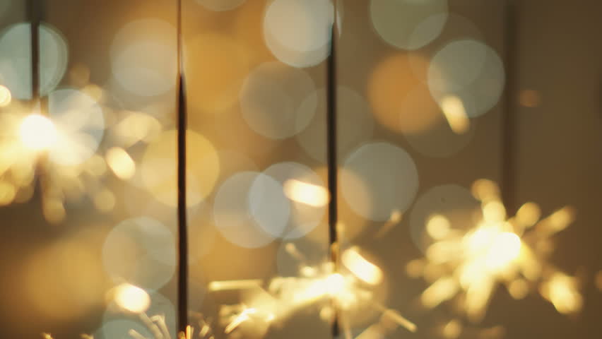 Focus pulling through hanging sparklers.