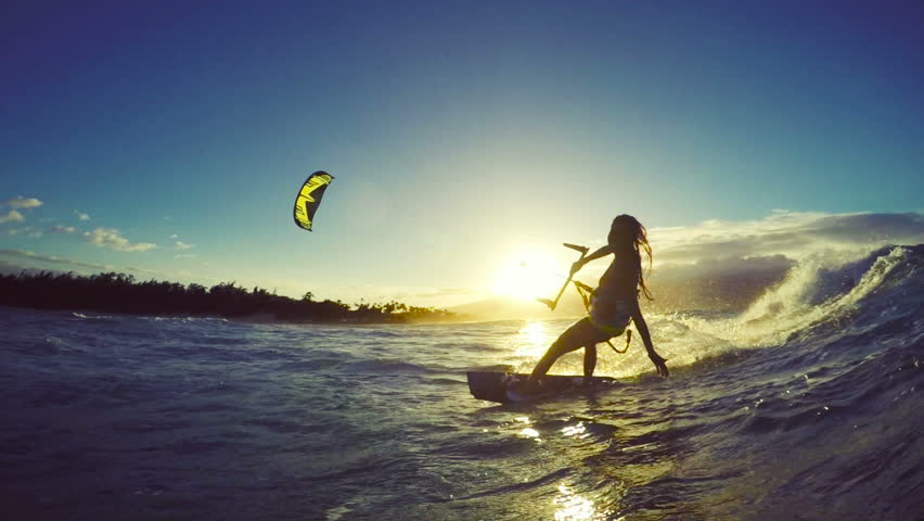 Extreme Kitesurfing At Sunset Summer Ocean Sport In Slow Motion Girl Kite Surfing In Bikini