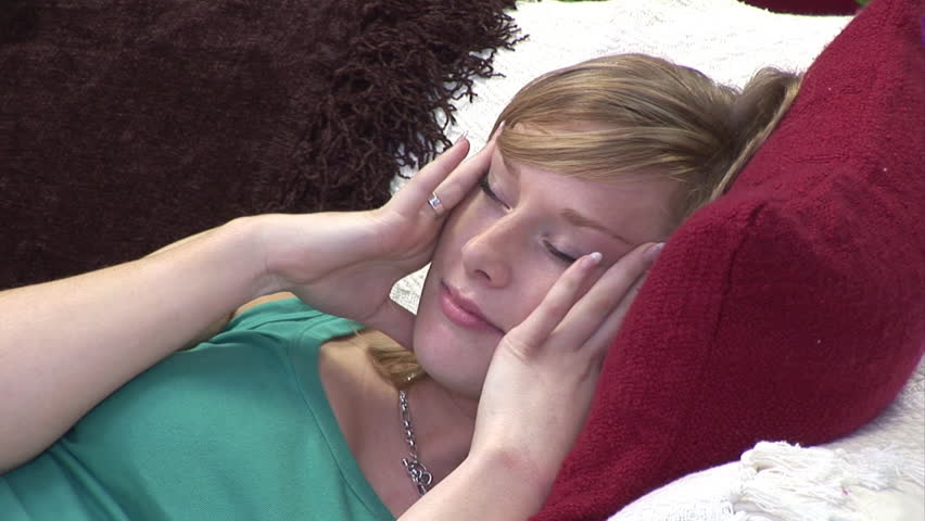 Attractive Woman relaxing  on sofa
