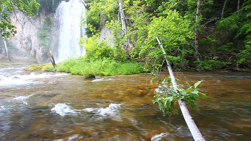 Spearfish Falls flows through the Black Hills National Forest of South Dakota