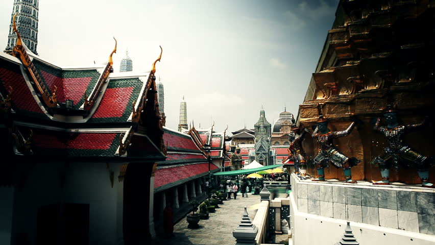 Richly decorated golden buildings of grand palace temple in Bangkok