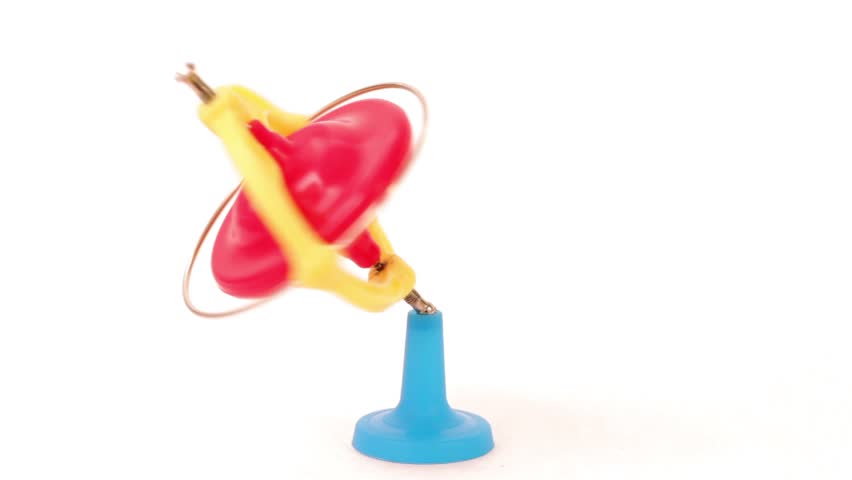 Spinning red, blue and yellow whirligig, children toy isolated on white
