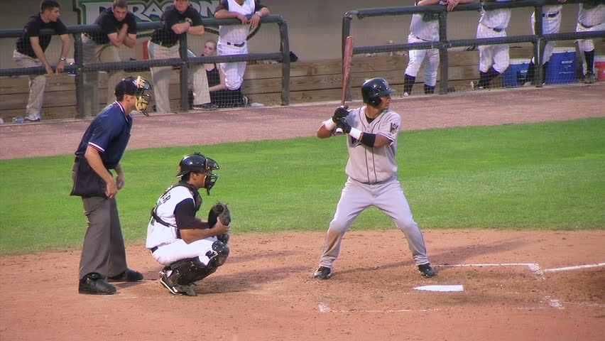 Catcher stops low pitch

