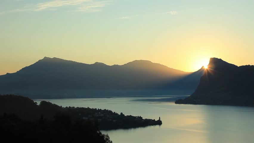 Sunrise at swiss mountains with lake lucerne in front