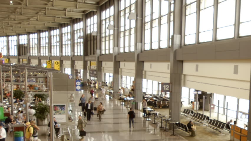 Timelapse of travelers in an airport