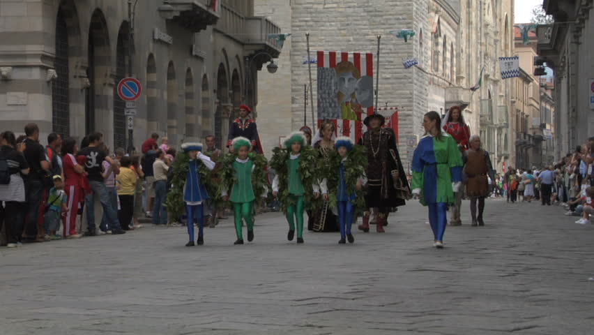 COMO, ITALY - CIRCA SEPT 2011:  Palio del Baradello re-enacts Barbarossa's visit to his allies in Como after defeating Milan in the 1159 battle, circa Sept 2011, Como, Italy. Period dances, games and shows create a medieval atmosphere at this annual event
