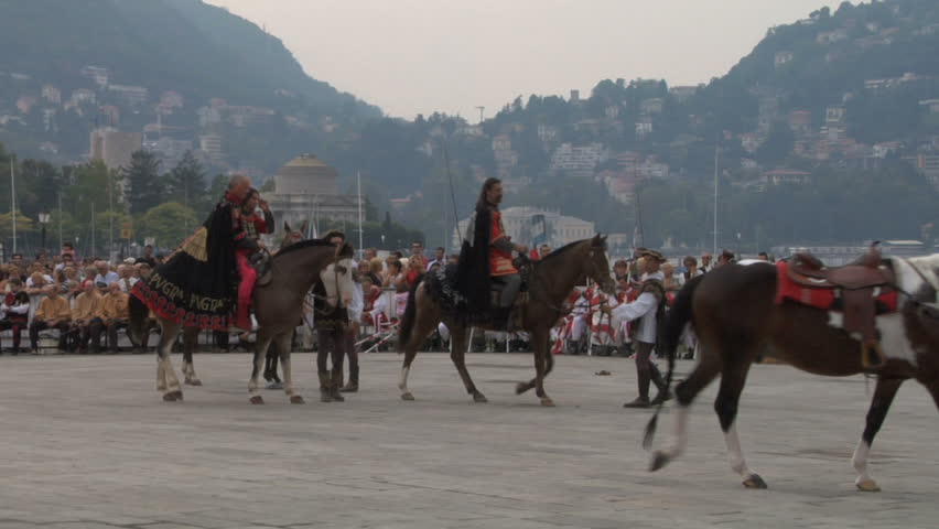 COMO, ITALY - CIRCA SEPT 2011:  Palio del Baradello re-enacts Barbarossa's visit to his allies in Como after defeating Milan in the 1159 battle, circa Sept 2011, Como, Italy. Period dances, games and shows create a medieval atmosphere at this annual event