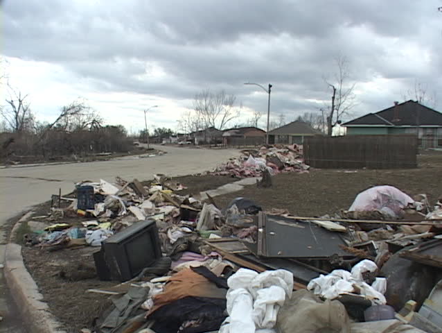 Garbage and refuse is scattered around a neighborhood following Hurricane Katrina.