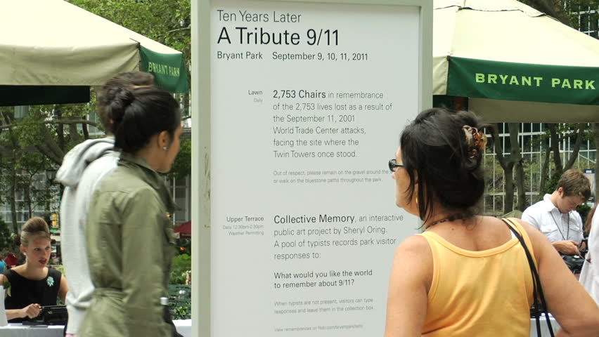 NEW YORK - SEPT 11:Typists in Bryant Park record what park visitors want the world to remember about 9/11 for an interactive public art project by Sheryl Oring on September 11, 2011 in New York.