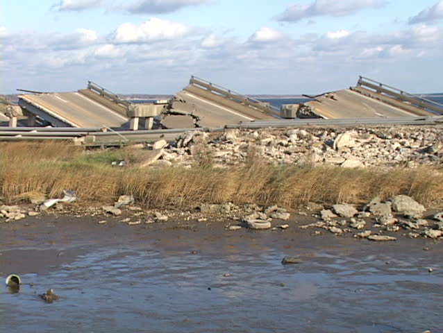Medium shot of the rubble from a bridge damaged during Hurricane Katrina.