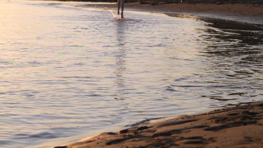 woman running on the beach