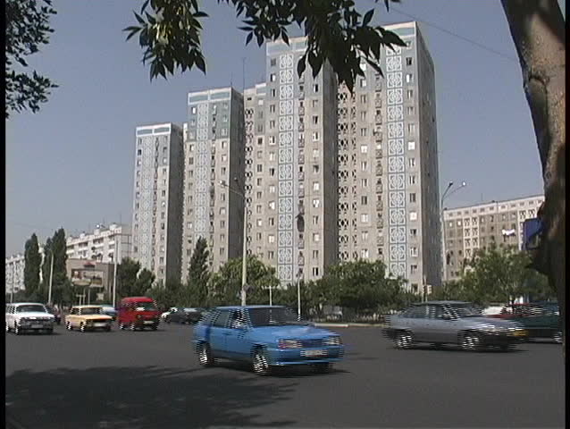 Traffic travels along a busy street in Tashkent, Uzbekistan.