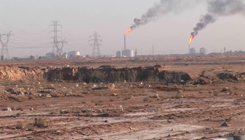 Burning extraction wells in an oil or natural gas field in Iran.