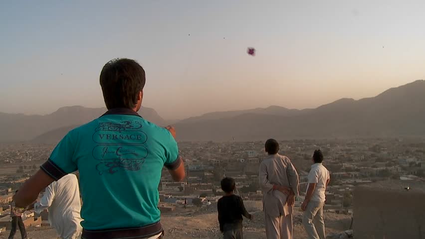KABUL, AFGHANISTAN - CIRCA 2009: A fierce kite battle on a hill overlooking circa 2009 in Kabul, Afghanistan. Afghanistan is an impoverished and least developed country, one of the world's poorest.