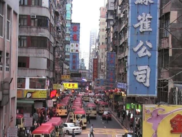 Elevated view of Mini buses and pedestrians in Mong Kok Hong Kong Street