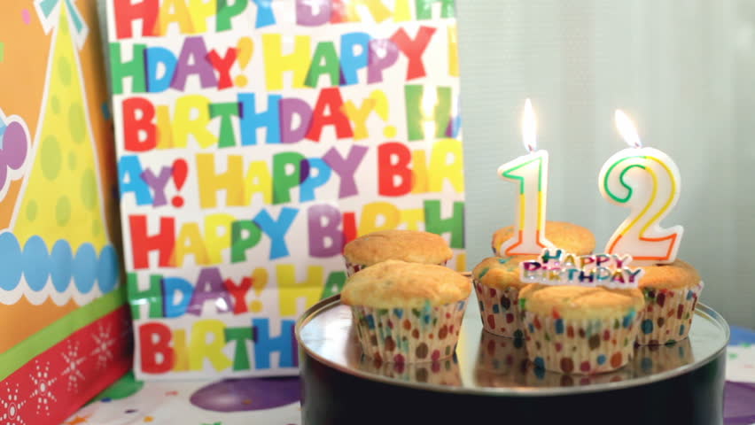 Birthday candles blown out age twelve