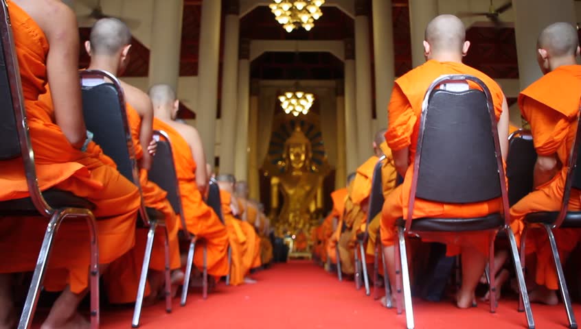 CHIANG MAI, THAILAND - AUGUST 15: Buddhist monks meet inside temple in Wat Phra Singh, August 15, 2011, Chiang Mai, Thailand. Buddhism in Thailand is represented by the presence of Buddhist monks who are responsible for preserving Buddha's teachings. 