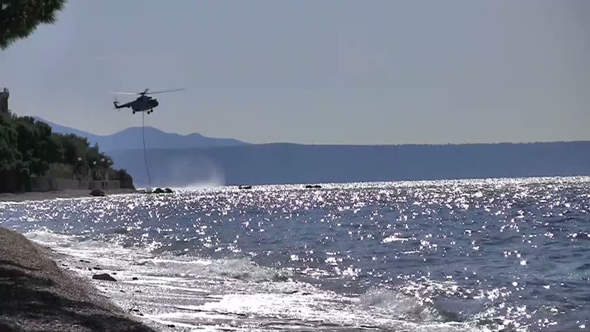 Army chopper in action at sea