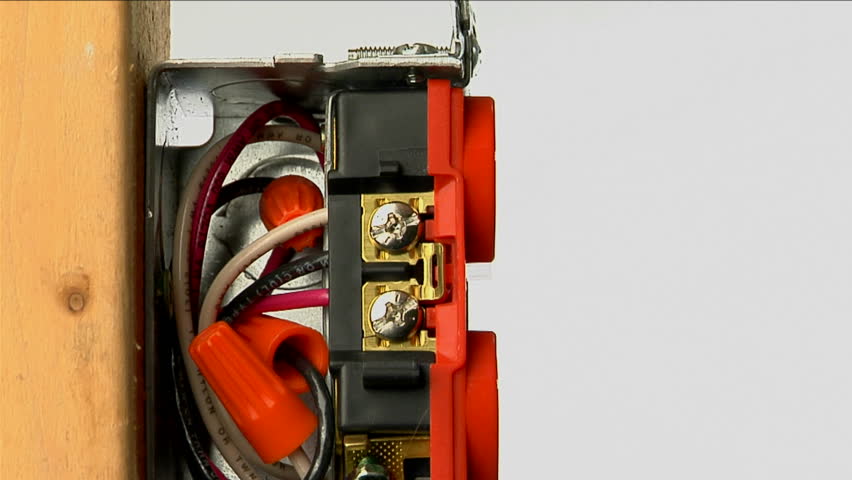 A power cord plugs into an outlet