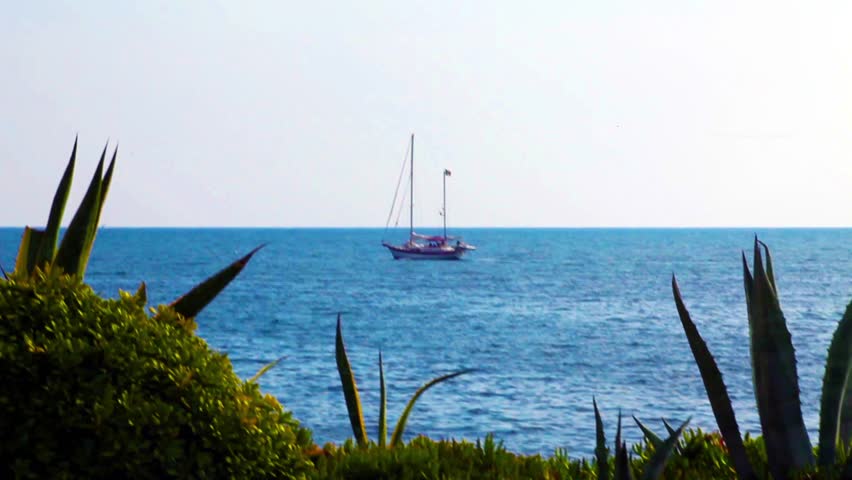 Caravel At Elba Island - Beautiful caravel navigating in the blue waters in front of Porto Azzurro, Elba Island.
