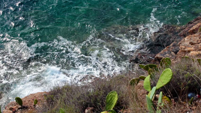 Waves Slamming The Shore - View from above of the waves slamming  the shore, Porto Azzurro, Elba Island, Italy.