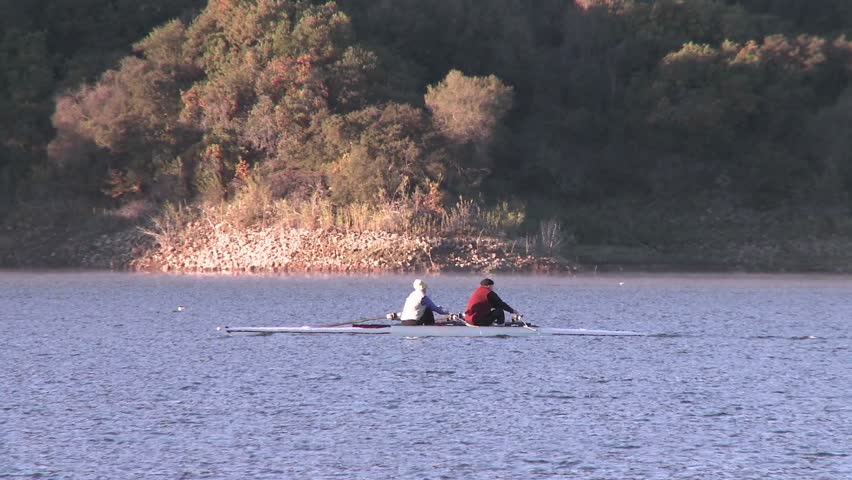 OAK VIEW, CA - CIRCA 2009: Two people rowing a double scull on Lake Casita circa 2009 in Oak View, CA.