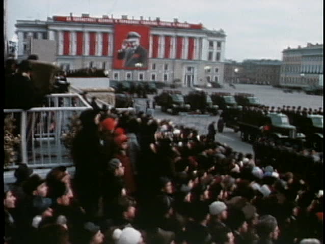 MOSCOW, RUSSIA - CIRCA 1970: Troops parade with tanks and bombs at an old Soviet military event.
