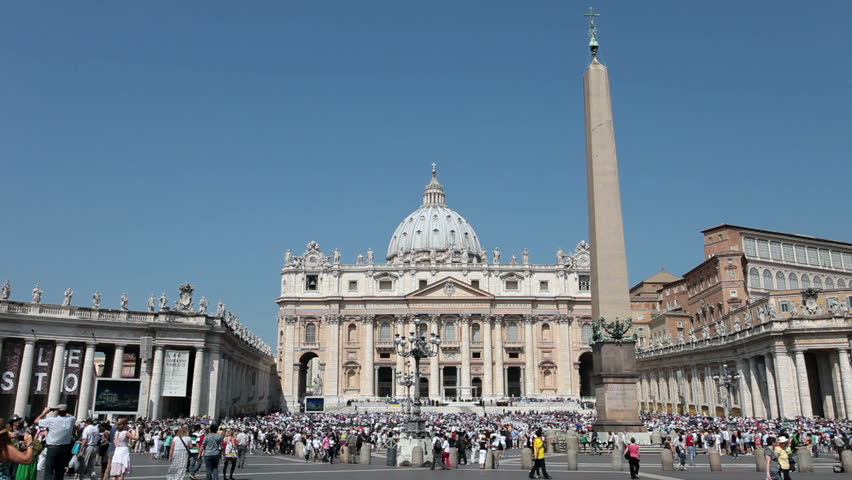 Tourists and pilgrims gather at St Peter Square to listen to the Pope on steps of Cathedral May 25, 2011. Rome, Italy. Words of wisdom to Catholic church members.