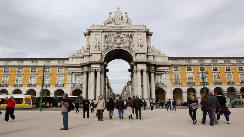 LISBON,PORTUGAL - NOVEMBER 12: (Timelapse View) Crowds at Rua Augusta Arch on November 12, 2011 in Lisbon city centre.The Rua Augusta Arch is a triumphal arch-like building on Commerce Square. 