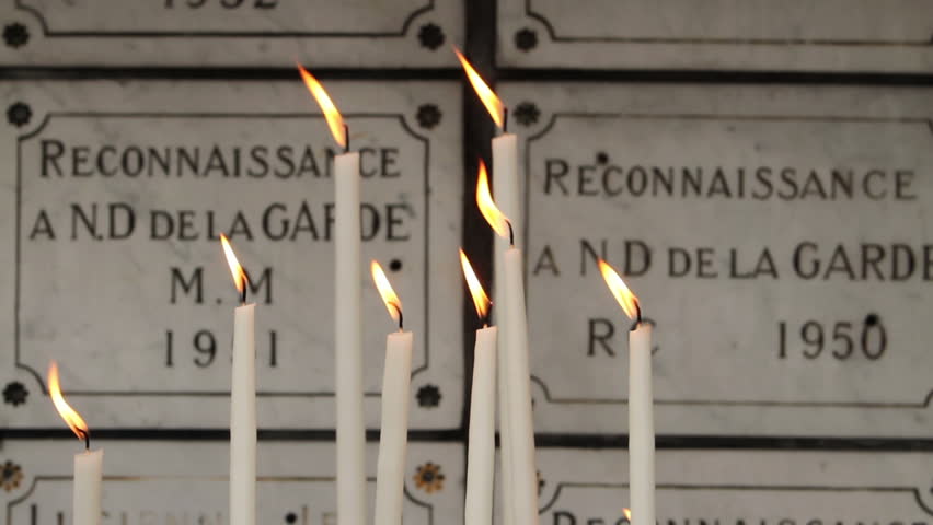 Prayer candles for worship in Notre Dame de la Garde Cathedral Marseille France May 23 2011.