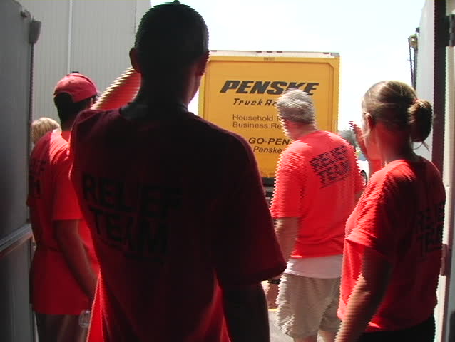 A team of Katrina volunteers prepare to unload a truck load of donated goods and supplies for victims of the hurricane.