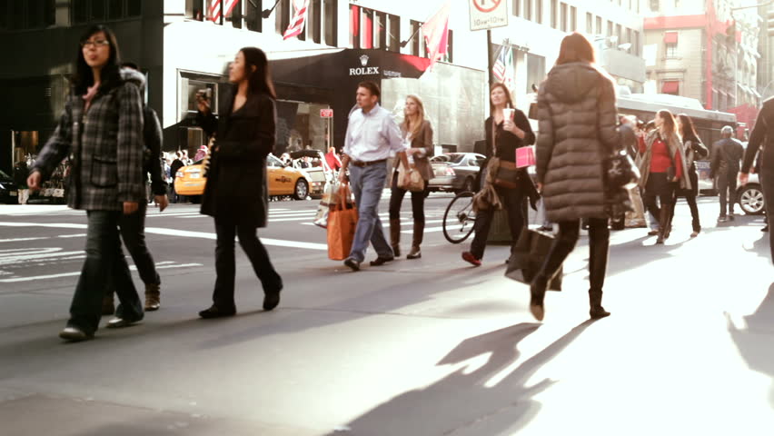 NEW YORK CITY, NY - NOVEMBER 25: People walking on Streets of New York during Black Friday shopping on November 25, 2011 in New York City, New York. 
