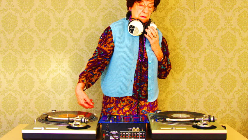 a very funky elderly lady dj, spinning records!!