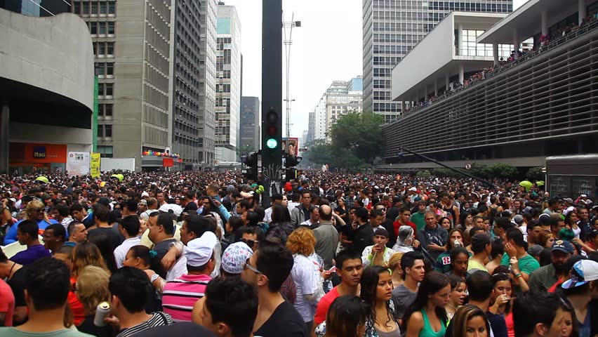 SAN PAULO, BRAZIL - CIRCA JUNE 2011: Crowds celebrate the LGBT Gay Pride Parade on Avenida Paulista circa June 2011 in San Paulo.