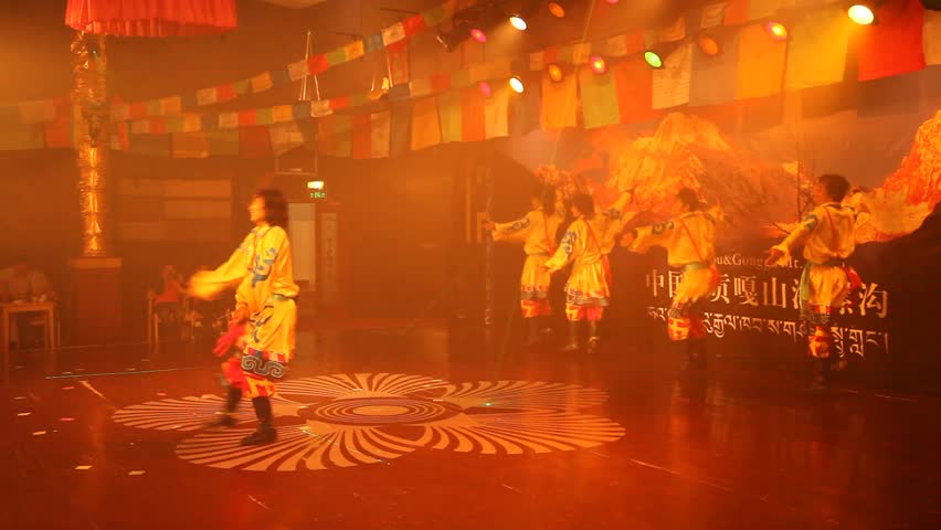 MOXI, CHINA - AUG 1, 2009: An event features Tibetan-Chinese folk dancing on August 1, 2009 in Moxi.