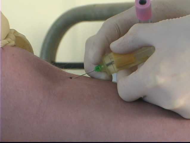 close up shot of giving blood